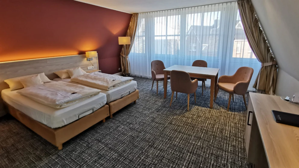 Blick in ein Mehrbettzimmer im Hotel Duhner Landhaus