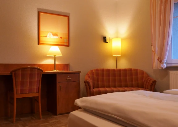 Blick in ein Schlafzimmer einer Ferienwohnung im Haus Dallacker, Duhnen