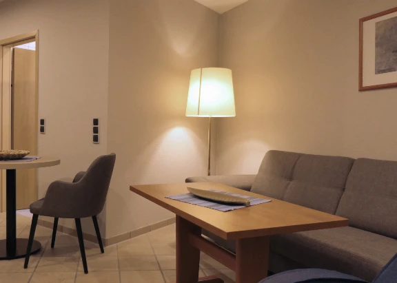 Blick in ein Wohnzimmer mit gemütliche Sitzecke im Haus Godewind