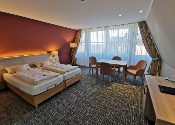 Dreibettzimmer im Hotel Duhner Landhaus in Duhnen bei Cuxhaven